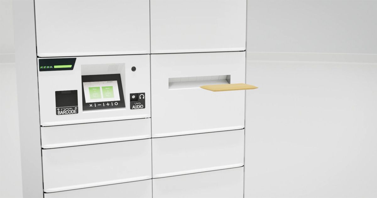 A woman posts a letter through the integrated mail slot of the parcel locker.