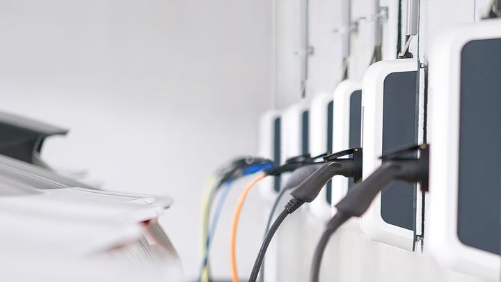 Close-up of multiple installed charge points in a row.