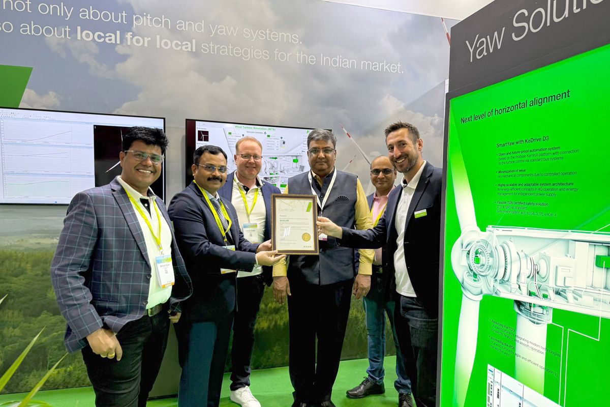 Suzlon and KEBA representatives interacting at the KEBA trade fair booth. 