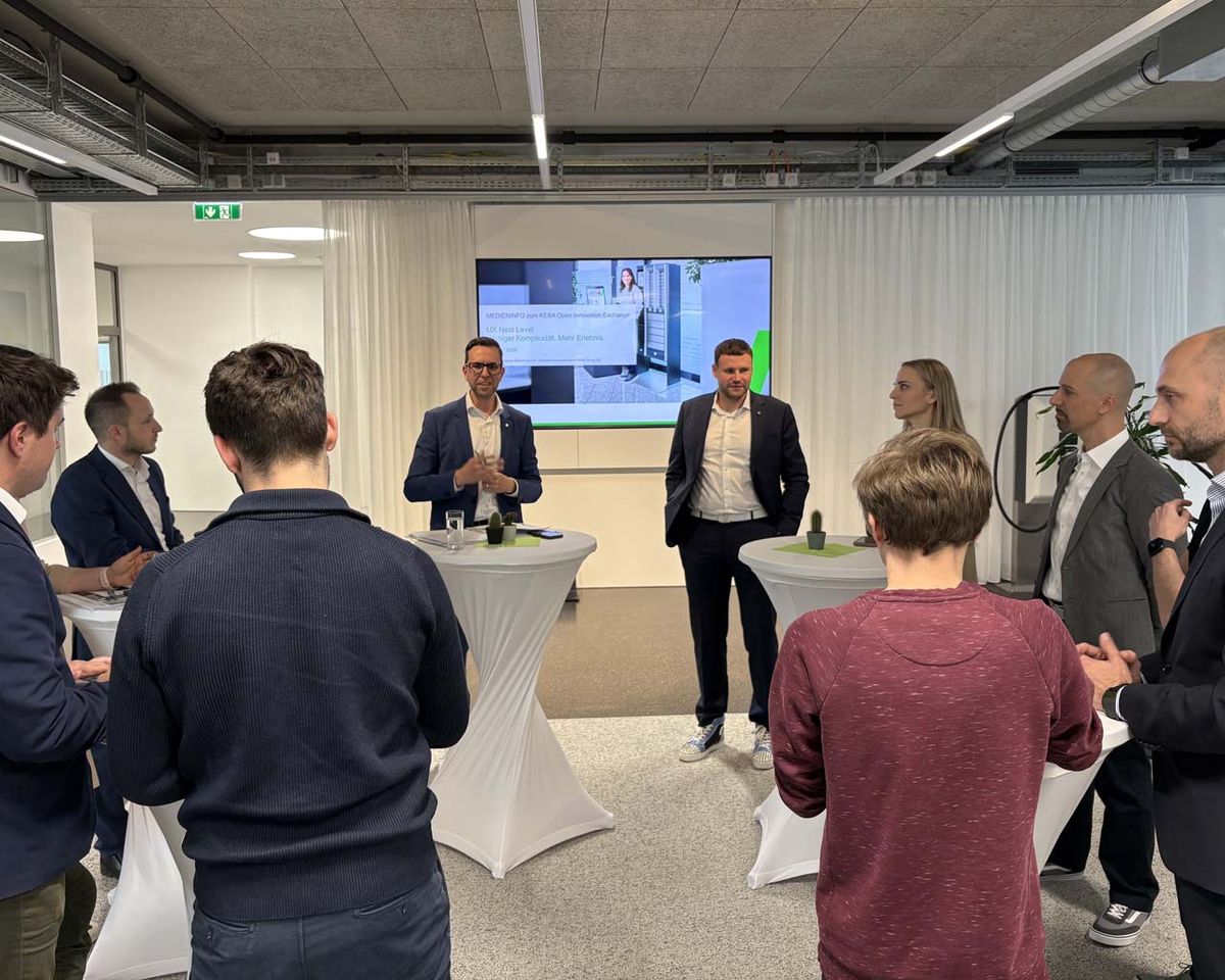 KEBA CEO Christoph Knogler and Jürgen Kusper, CEO of KEBA Handover Automation GmbH, present at the Open Innovation Exchange.