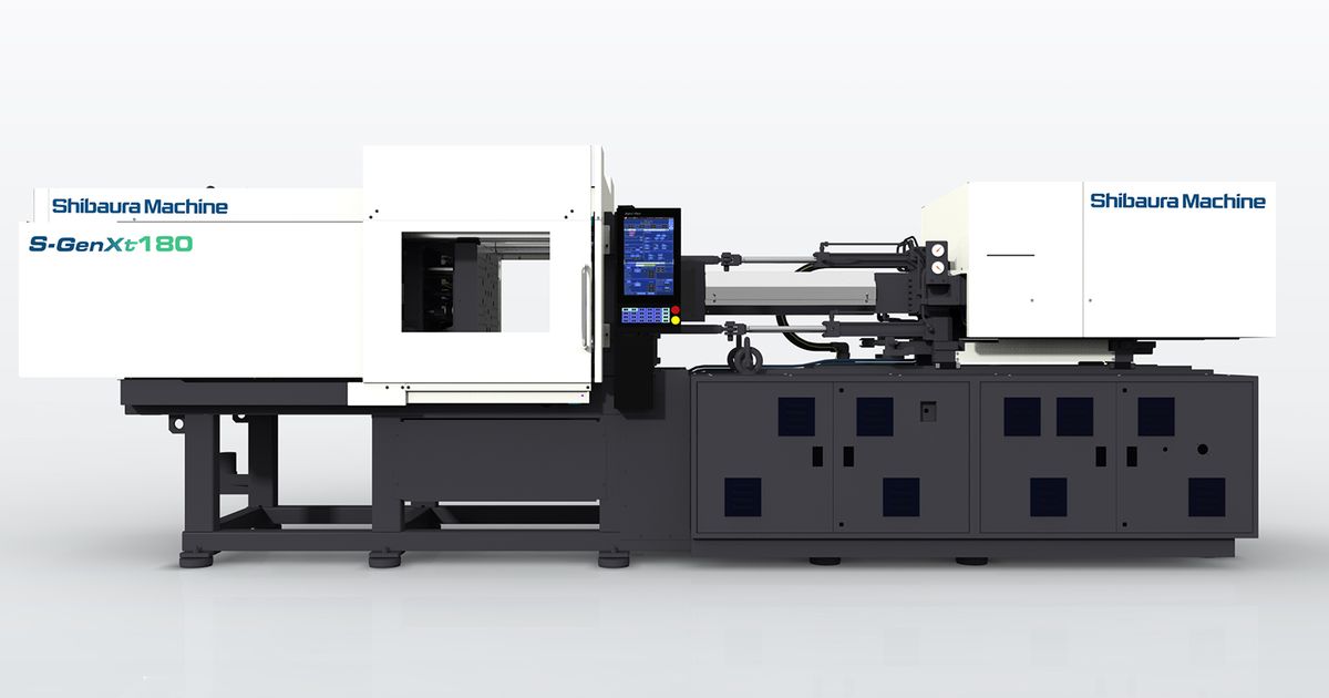 Side view of a Shibaura Machine S-GenXt180 injection molding machine with control panel and closed mold area.