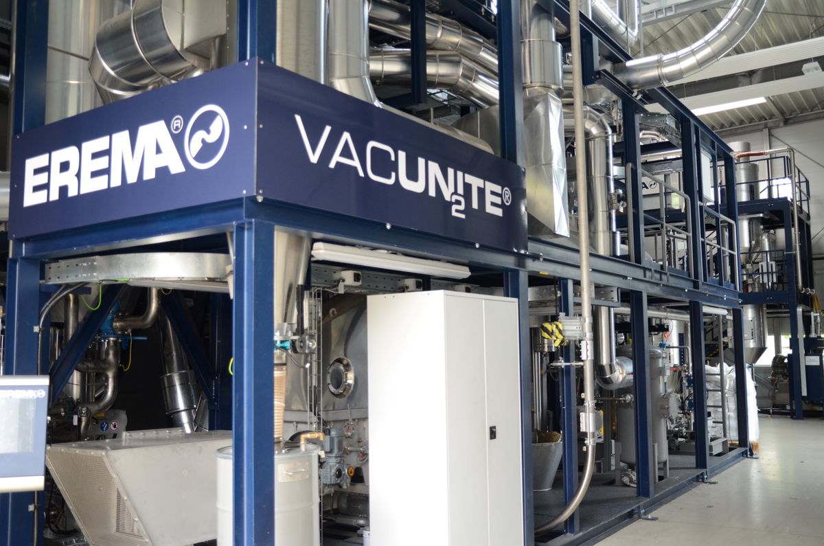 Industrial EREMA VACUNITE® system with stainless steel piping and automation components – an example of energy-efficient plastic recycling technology featuring integrated KEBA control.
