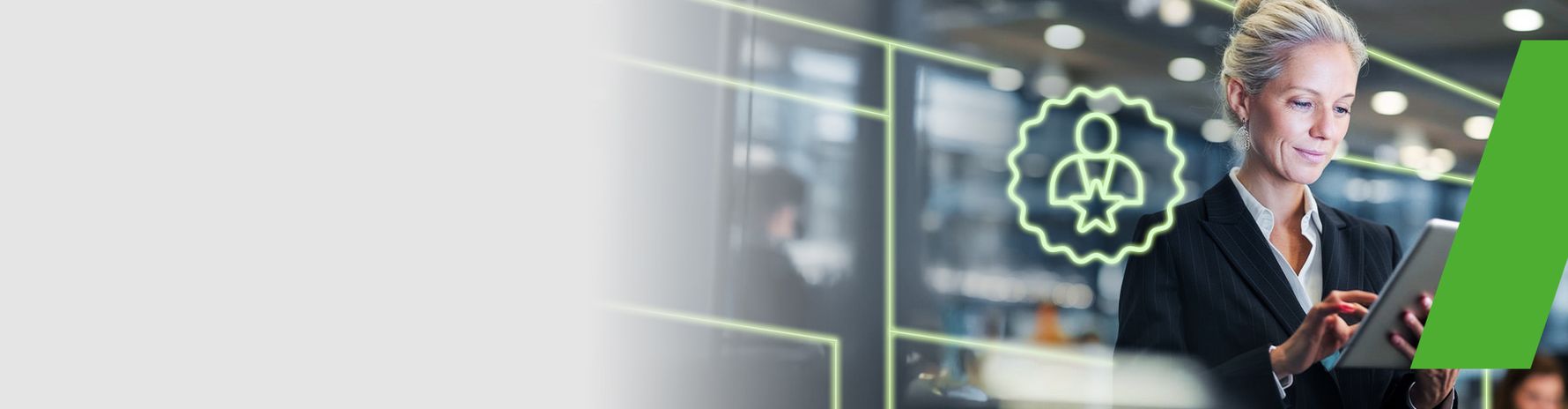 Businesswoman working on a tablet in a modern setting; symbol of quality and customer focus in the background.