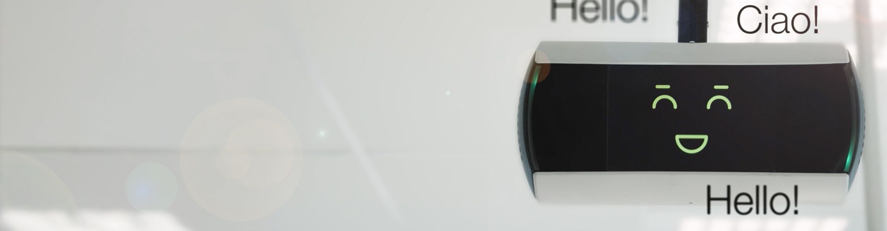 KeBob is shown - digital screen displays a smiling face with "Hello!" and "Ciao!" written nearby, suggesting a friendly greeting in multiple languages.