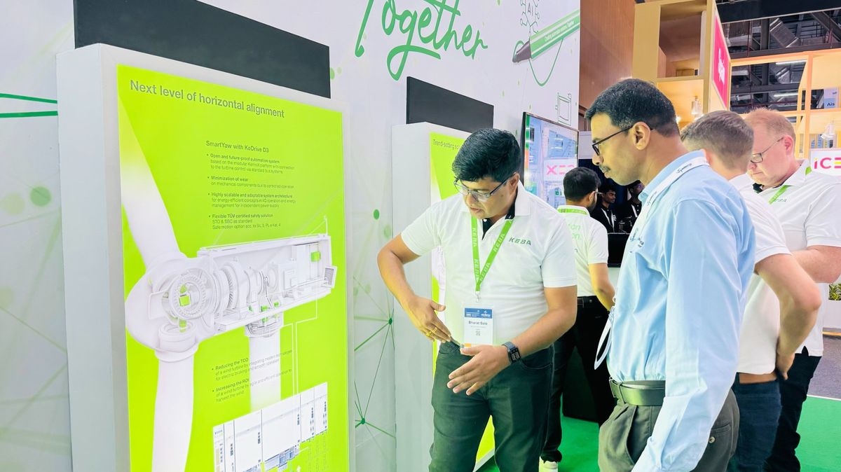 Visitors view the Smart Yaw wall.