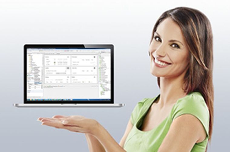 Picture of a lady balancing a laptop with the KeStudio suite on her hands.