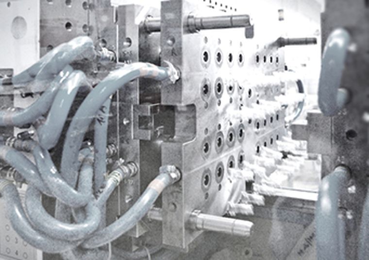 Detail of an injection molding machine, automation systems from KePlast i-series