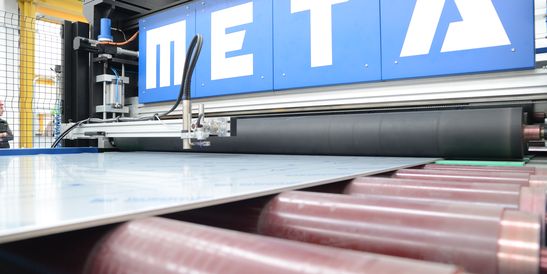 Close-up of a sheet metal handling system by Automazioni Meta Srl.