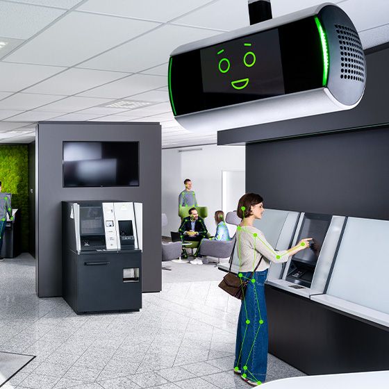 Bank branch with the KeBob AI monitoring system and a customer.