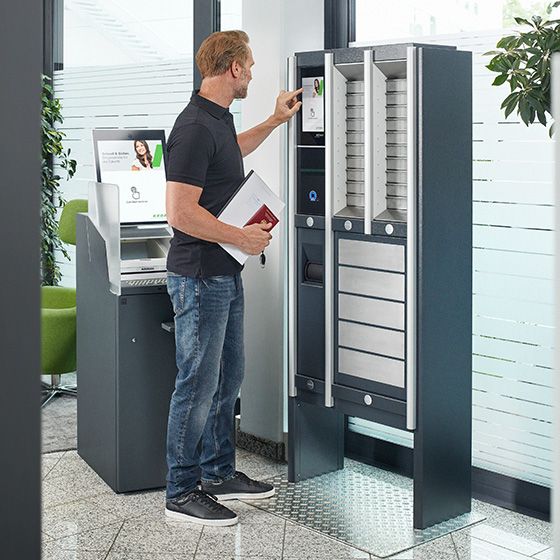 A man is using a KeCity citizen terminal.