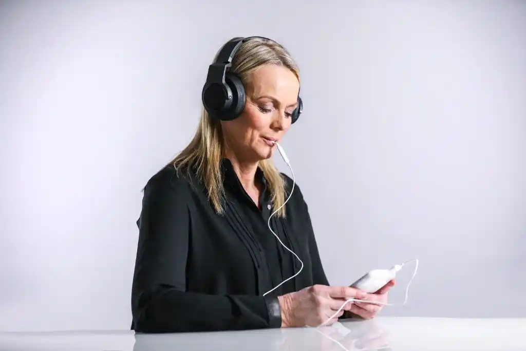 A patient uses the Lenire device. Source: Neuromod Devices
