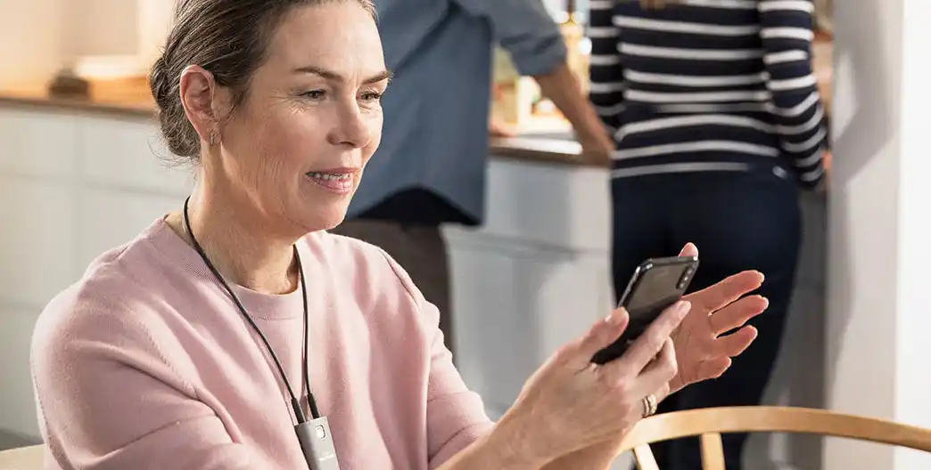 Your provider can send hearing aid program updates to the Widex Remote Care App, which transmits them—in real-time—to the hearing aids through the neck-worn Widex Remote Link accessory. 