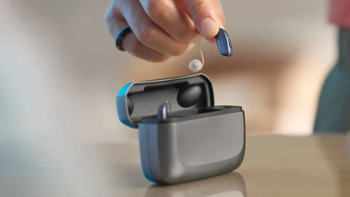 ReSound Vivia with its premium charger that offers onboard battery for up to 3 days of on-the-go portable charging.