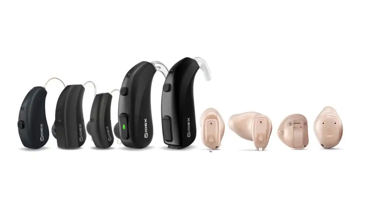The Widex MOMENT product line showing (l to r) the  SHEER rechargeable Receiver-in-Canal (RIC), RIC 312 D, and small RIC 10; the rechargeable Behind-the-Ear (BTE R) and BTE 13 D; followed by in-ear options of the Completely-in-Canal (CIC) Micro, In-the-Canal (ITC), In-the-Ear (ITE), and XP ITE. 