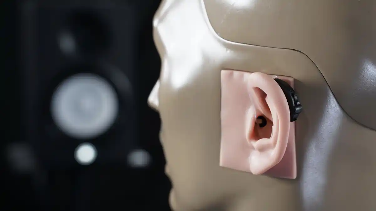 The KEMAR acoustic manikin wearing Lucid's Engage OTC hearing aids.
