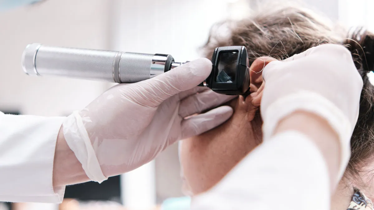 Otoscopy in action.