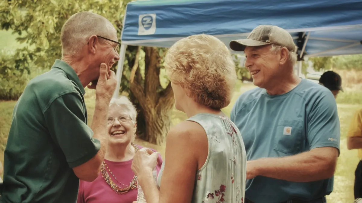 Seniors Chatting Outdoors