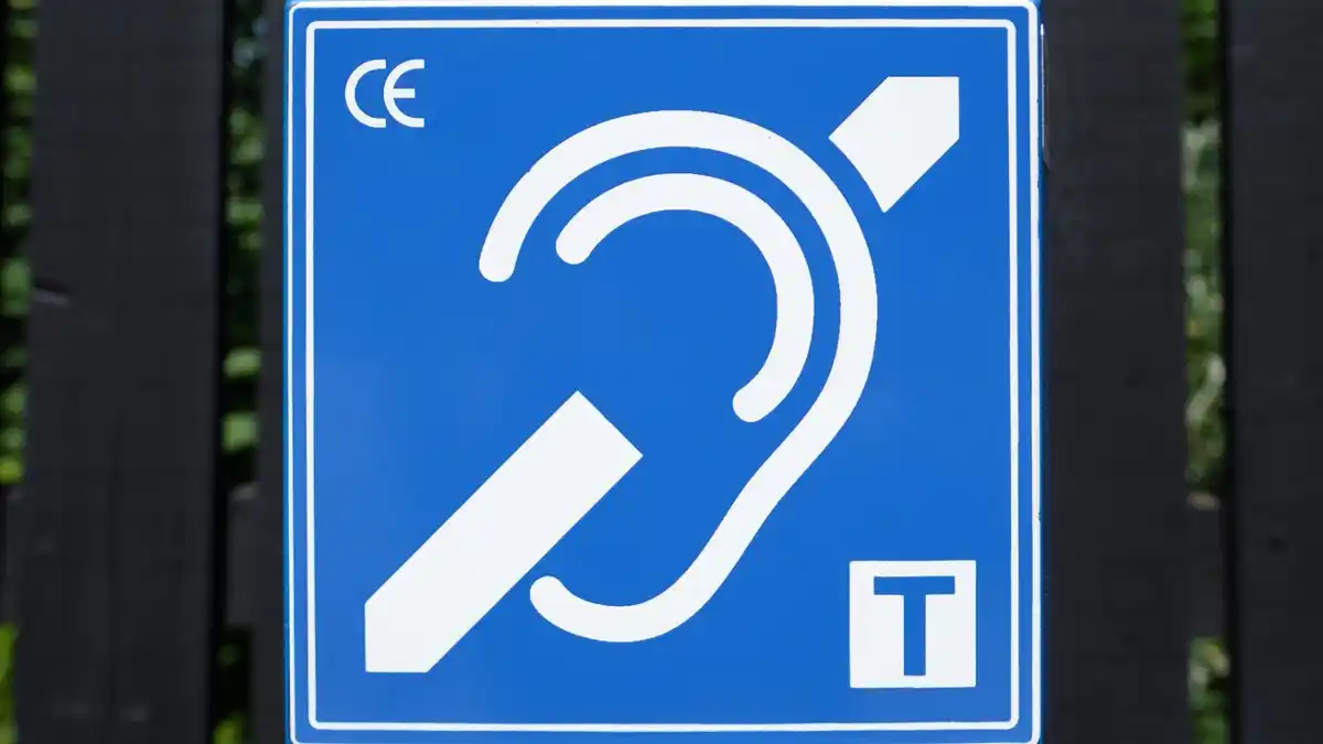 Look for airport signs that alert passengers to where they can receive communications via their telecoil-equipped hearing aids or implants.