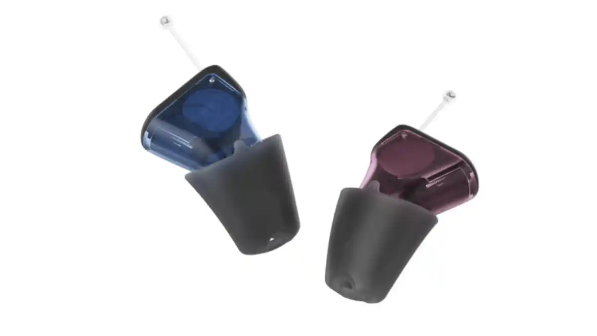 Signia Silk IX left-ear hearing aids in blue and right-ear hearing aids in red
