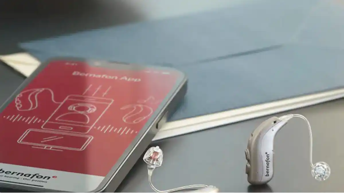 Smartphone with Bernafon app and two hearing aids