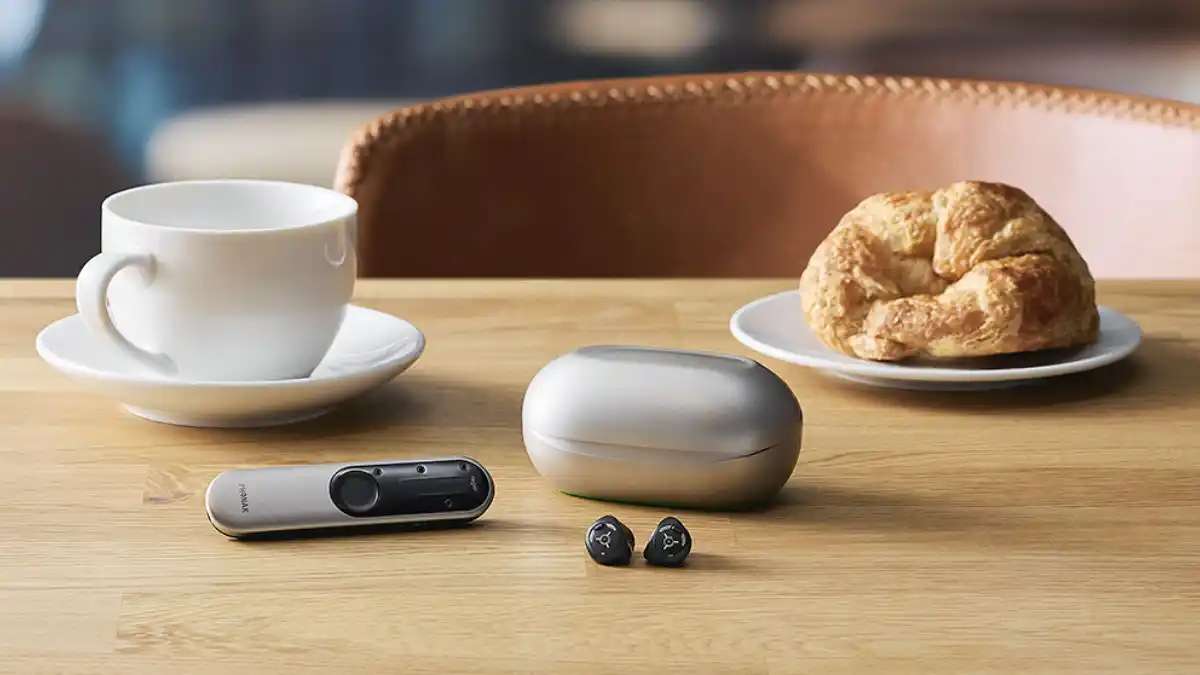 Phonak Virto R Infinio with charging case with optional Roger On remote microphone and controller.