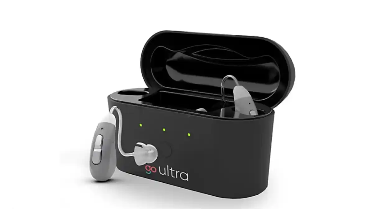 Go Ultra hearing aids with recharging unit.