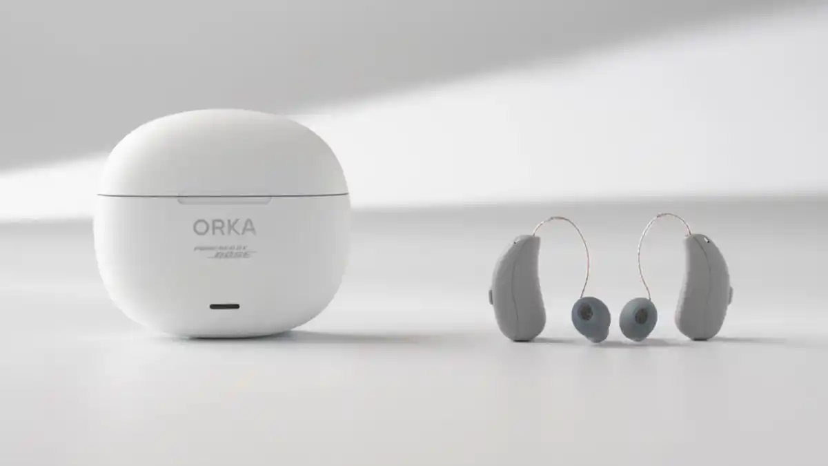Two ORKA O1 RIC hearing aids with white charging case