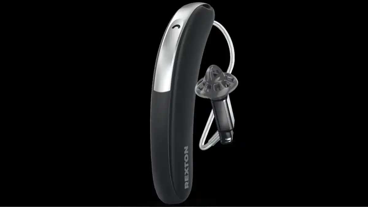 A black and silver colored Rexton BiCore Slim RIC hearing aid