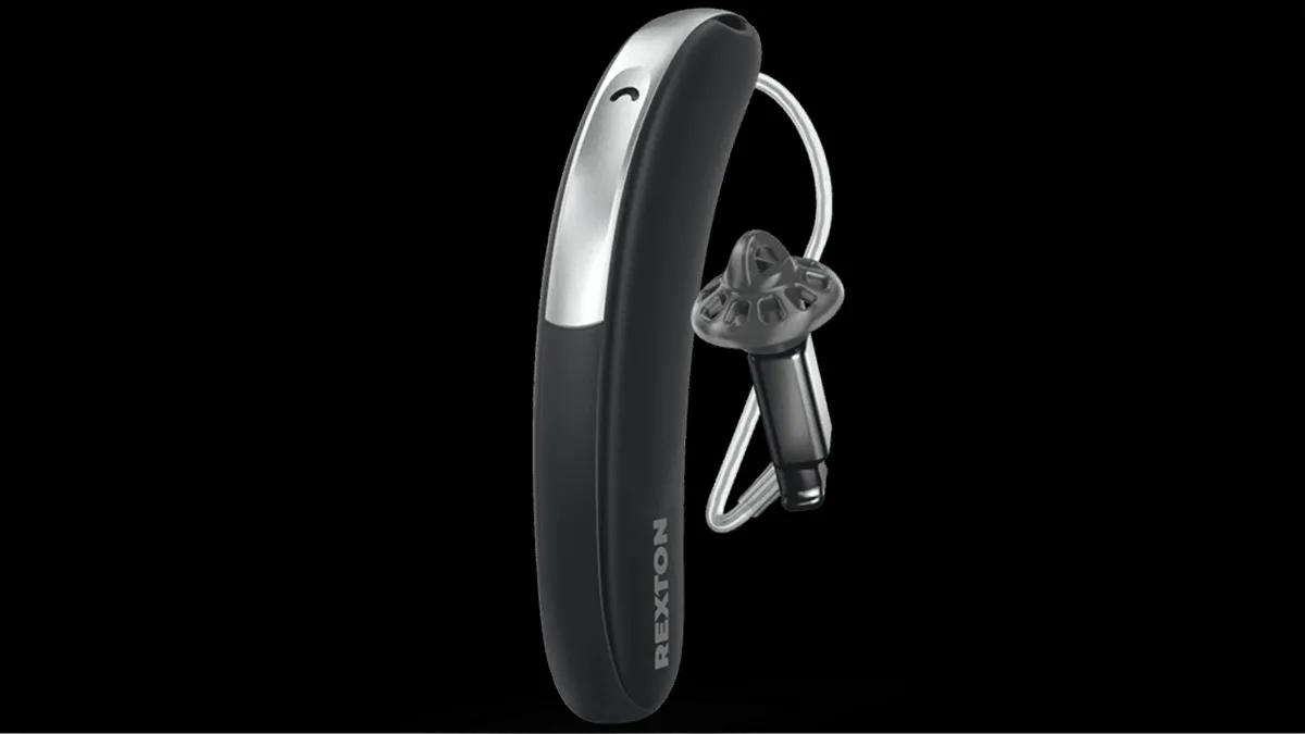 A black and silver colored Rexton BiCore Slim RIC hearing aid