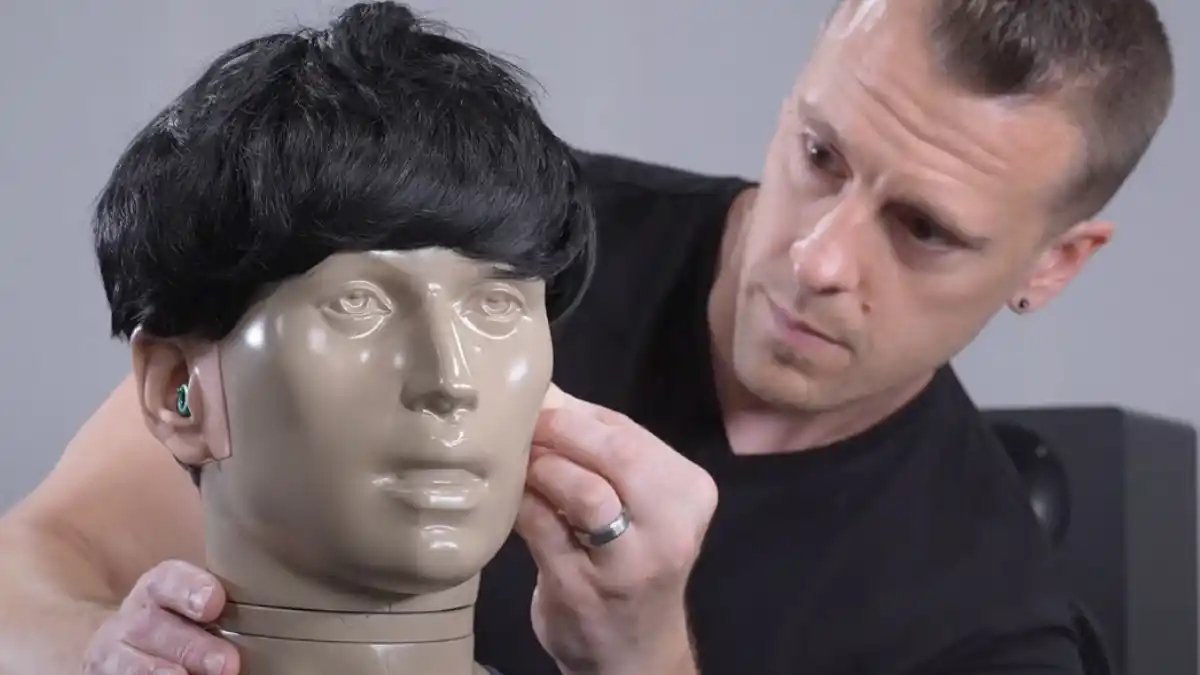 HearAdvisor Lab Director Dr Steve Taddei securely fitting Loop Earplugs on the acoustic test manikin. 