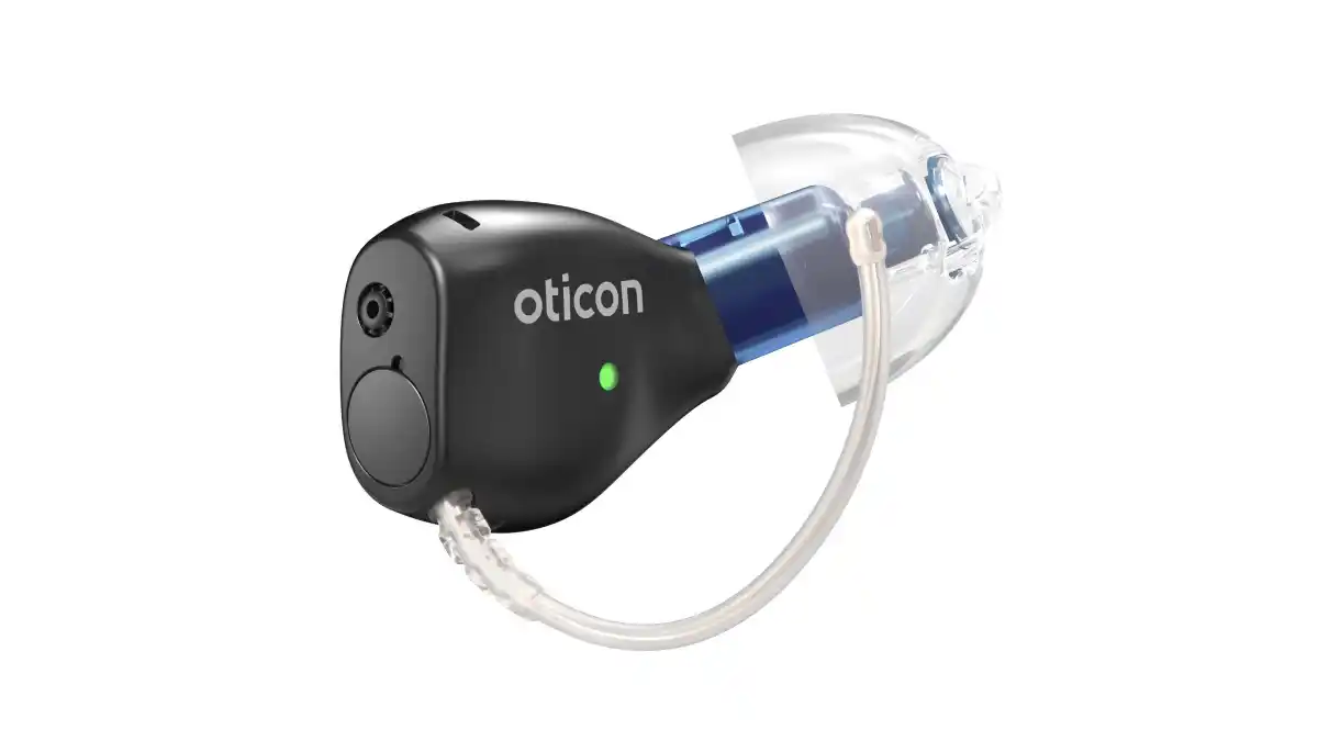 Oticon Zeal uses encapsulation technology (black portion) to safeguard the main electronic and battery components, while having an extended antenna which doubles as a system for ear retention and removal.