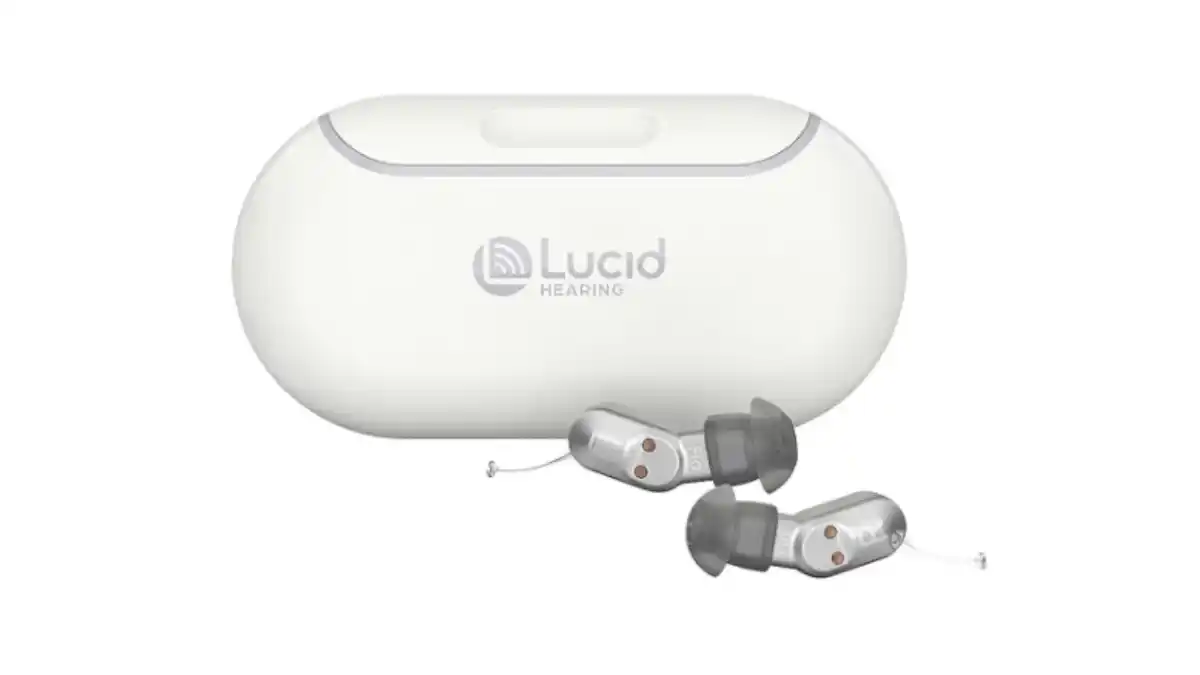 Lucid FIO in-the-ear (ITE) hearing aid and charger.