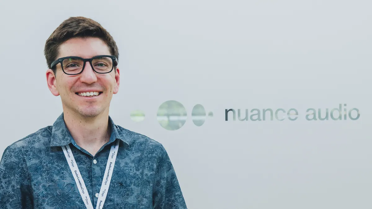 Photo of man with back Nuance Audio glasses