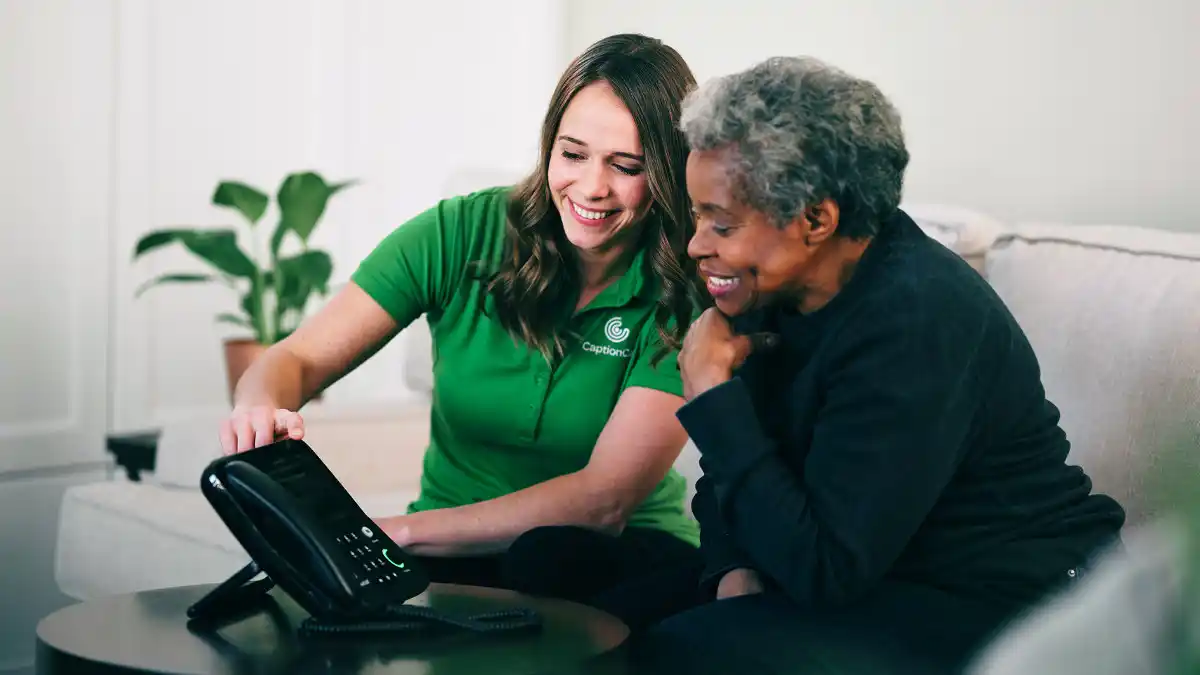 Some IP CTS providers send experts to your home and/or workplace to help you set up and get oriented with your captioned phone. Photo credit: CaptionCall.
