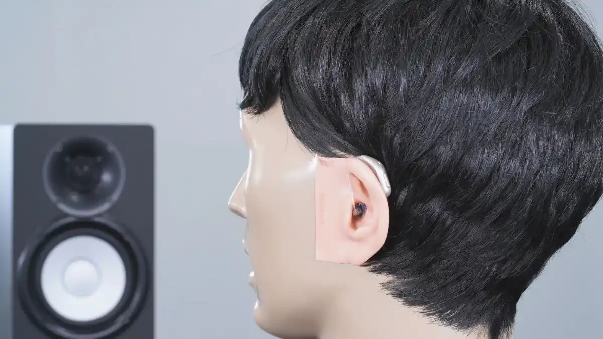 The Oticon Intent being tested by Dr. Steve Taddei in the HearAdvisor Lab using the KEMAR manikin.