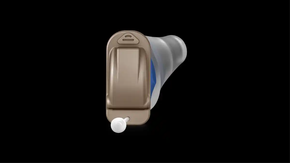 Rexton CIC battery-powered hearing aid against a black background