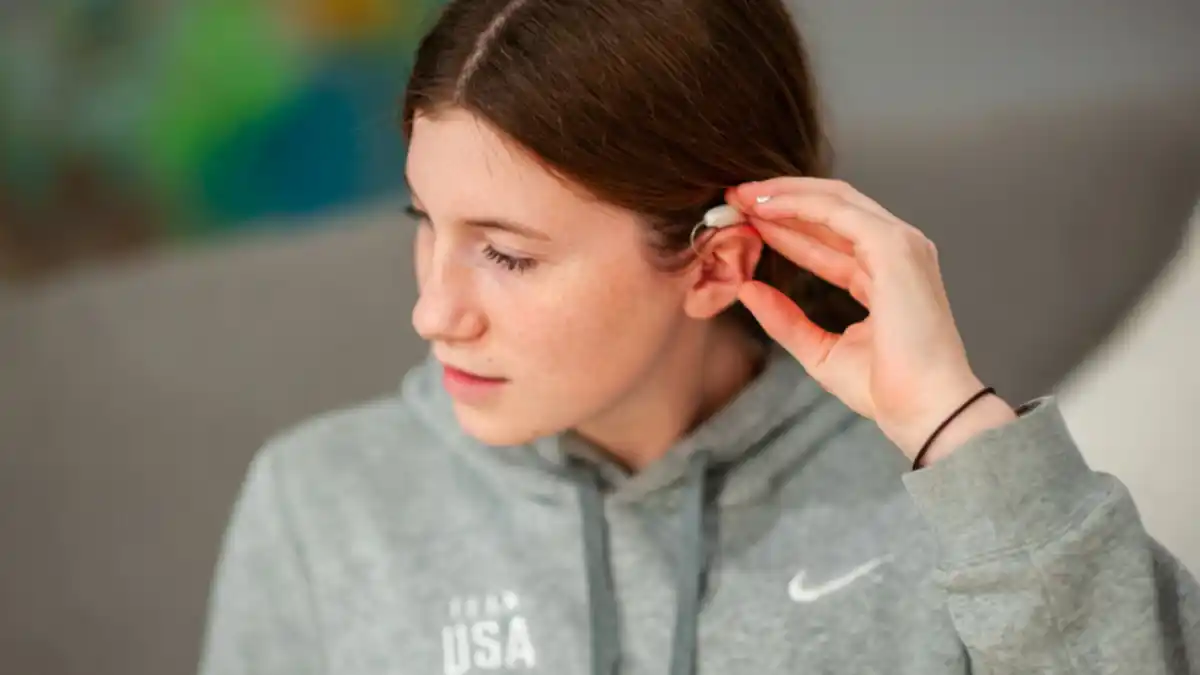 Hassrick with her Widex Allure hearing aids.