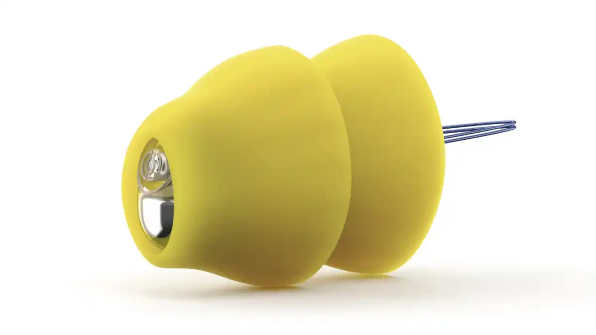 Yellow Lyric hearing aid with two flanges and removal loop