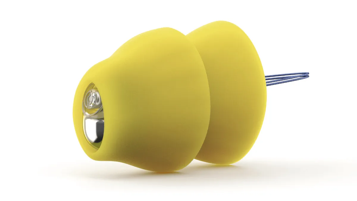 Yellow Lyric hearing aid with two flanges and removal loop