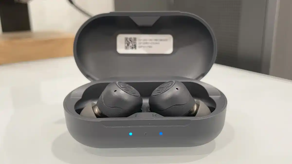 JLab HEAR on my desk in the portable charging case before use. 