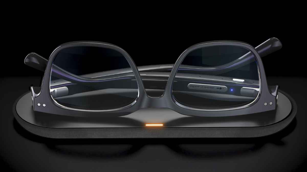 Nuance Audio glasses on charging pad.