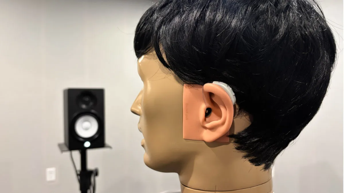 KEMAR manikin and hearing aid in test lab