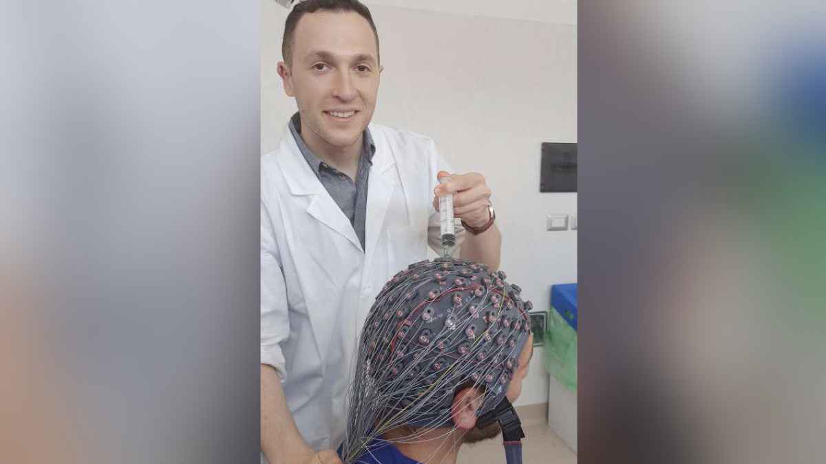 An EEG cap being setup for recording by graduate student Idan Nemirovsky. The photo was taken at the Institute of Sant’Anna, a neurorehabilitation center in Crotone, Italy, where with Dr. Francesco Riganello, the same EEG classification technique will be applied to patients with severe brain injury who suffer from disorders of consciousness.