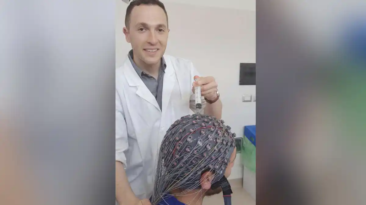 An EEG cap being setup for recording by graduate student Idan Nemirovsky. The photo was taken at the Institute of Sant’Anna, a neurorehabilitation center in Crotone, Italy, where with Dr. Francesco Riganello, the same EEG classification technique will be applied to patients with severe brain injury who suffer from disorders of consciousness.