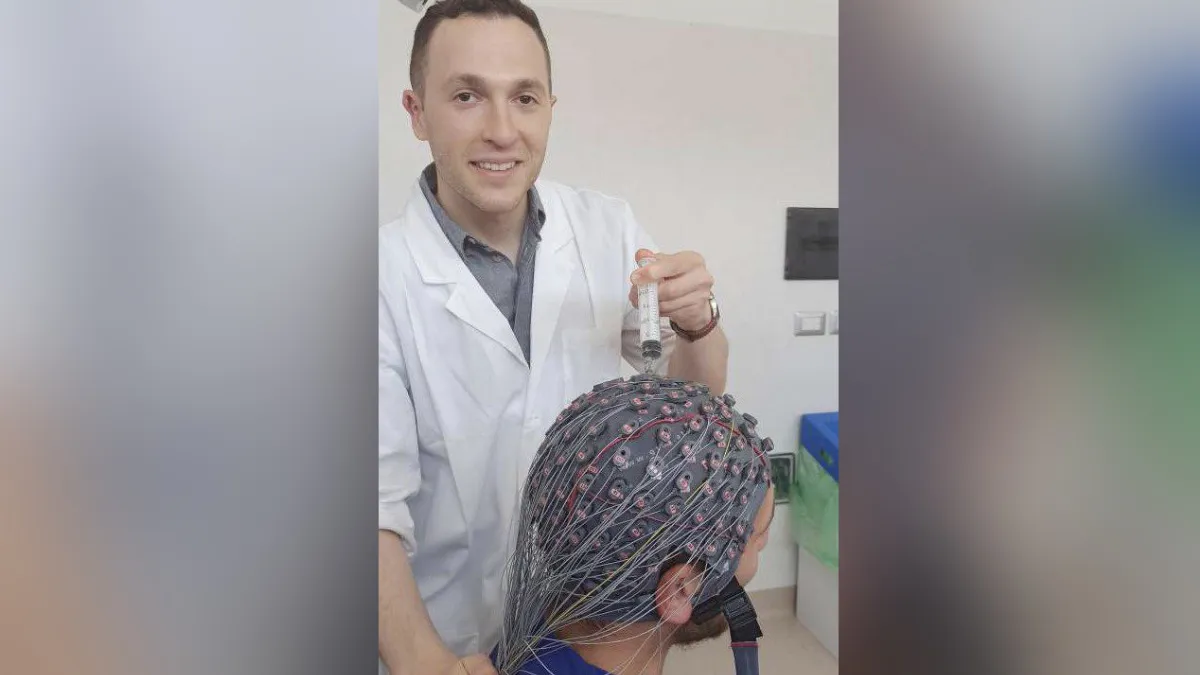 An EEG cap being setup for recording by graduate student Idan Nemirovsky. The photo was taken at the Institute of Sant’Anna, a neurorehabilitation center in Crotone, Italy, where with Dr. Francesco Riganello, the same EEG classification technique will be applied to patients with severe brain injury who suffer from disorders of consciousness.