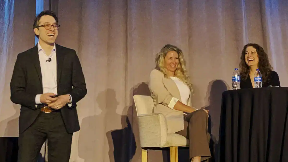 Dr. Reed during a light moment while presenting findings on the landmark ACHIEVE study at the 2023 Academy of Doctors of Audiology (ADA) conference.