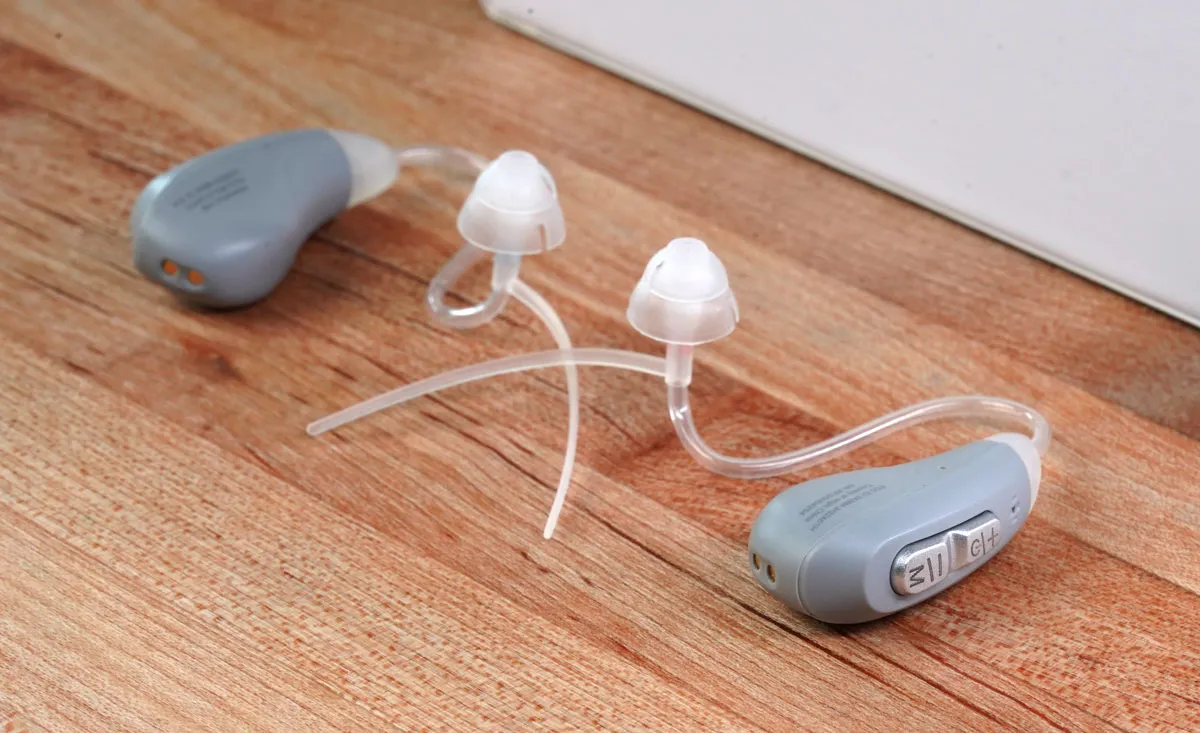 A multi-function rocker switch can be seen on the rear face of the hearing aids’ body. The larger buttons are easier to find and engage for changing various settings. 