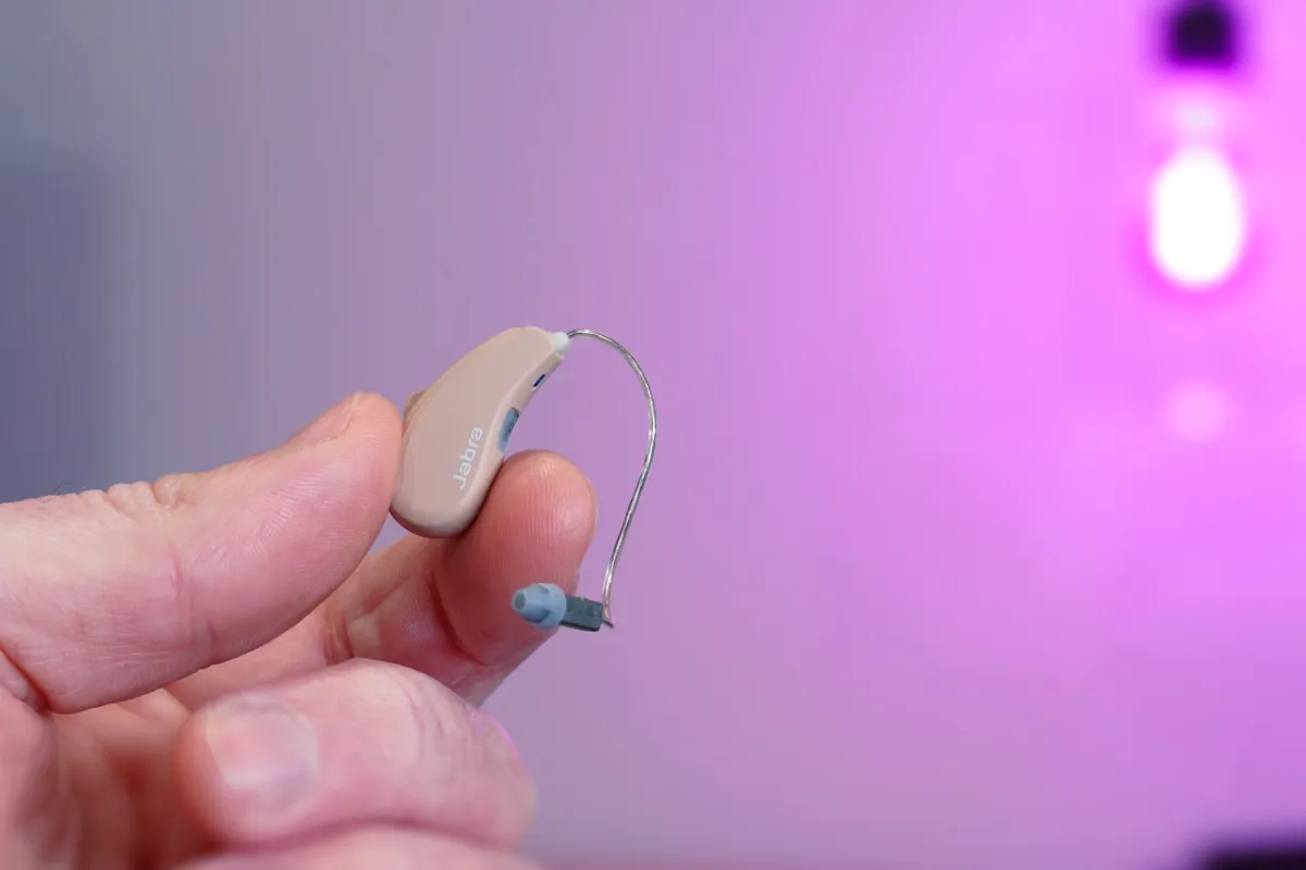 The Jabra Enhance Select 50R in my hand.
