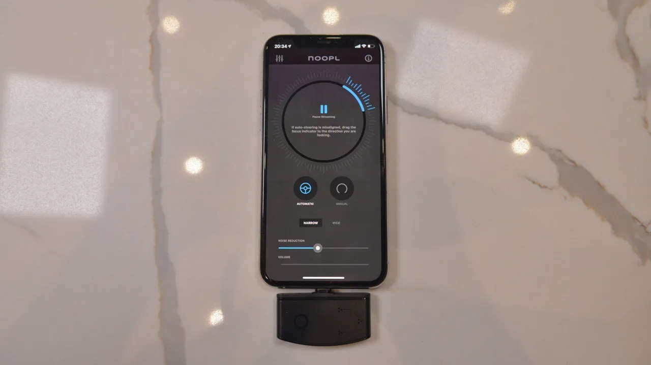 Noopl 2.0 attaches to the base of iPhone.