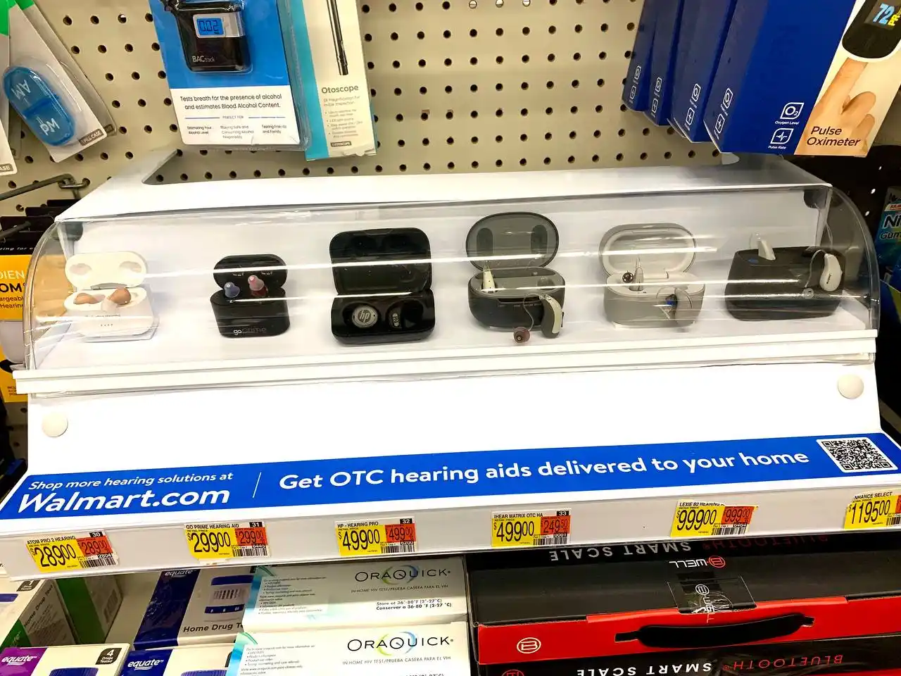Walmart in-store on the shelf display of five OTC hearing aids